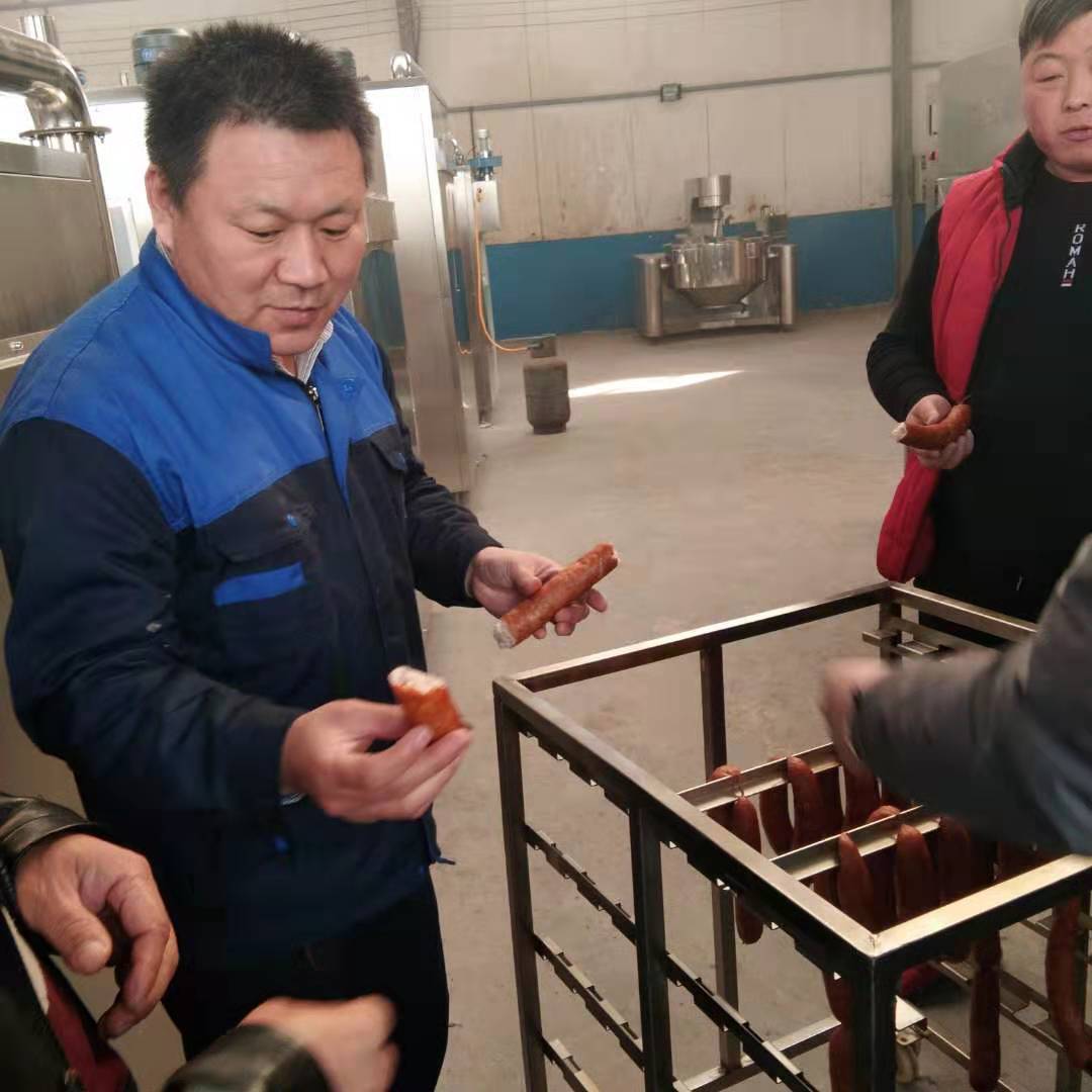 液壓灌腸機  自動香腸灌腸機  哈爾濱紅腸成套加工設(shè)備示例圖5