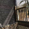 黑色流水石供應 別墅外墻天然文化流水石 青石花園墻疊水石